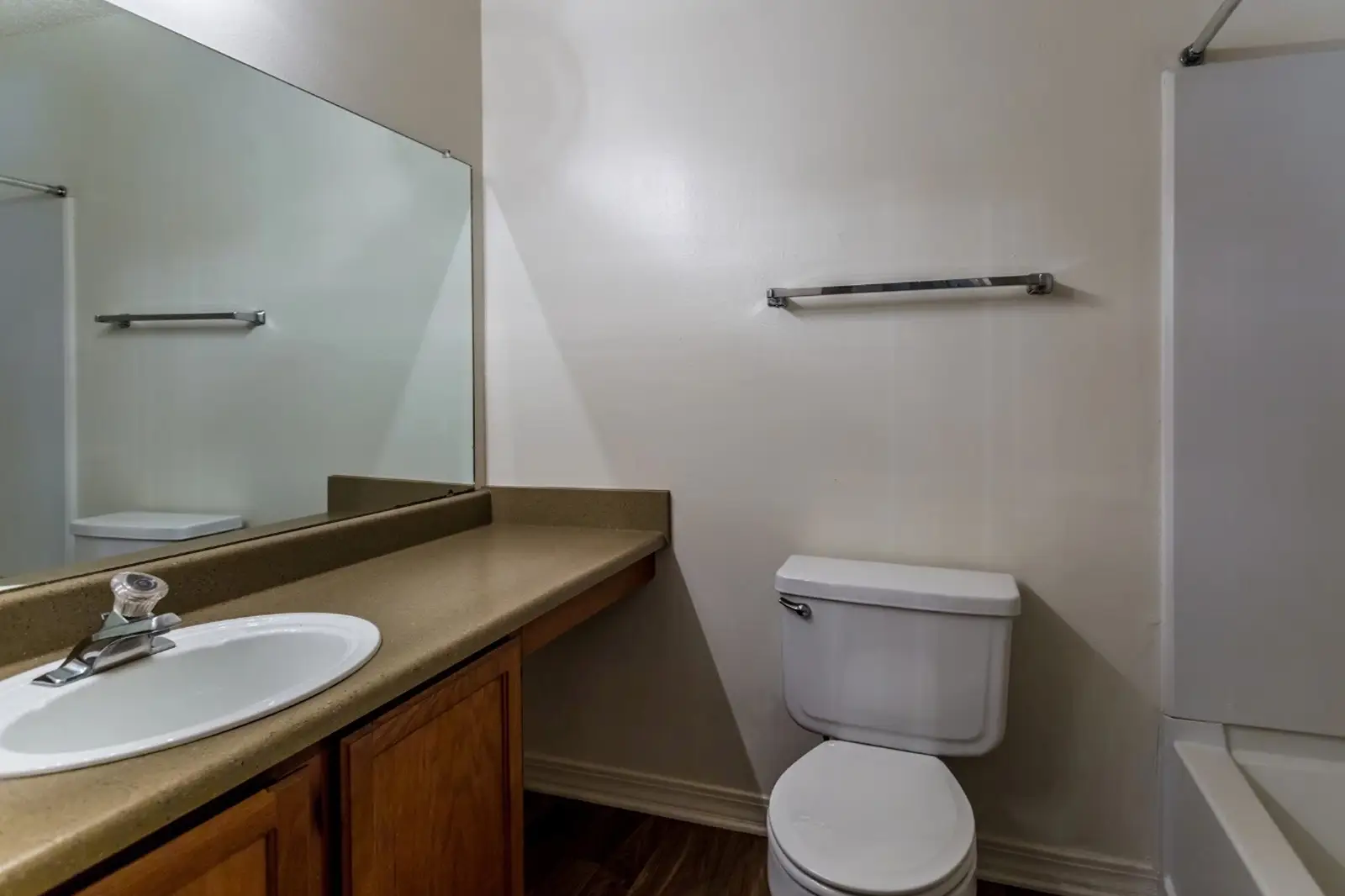 Full bathroom with sink, toilet, and bathtub.